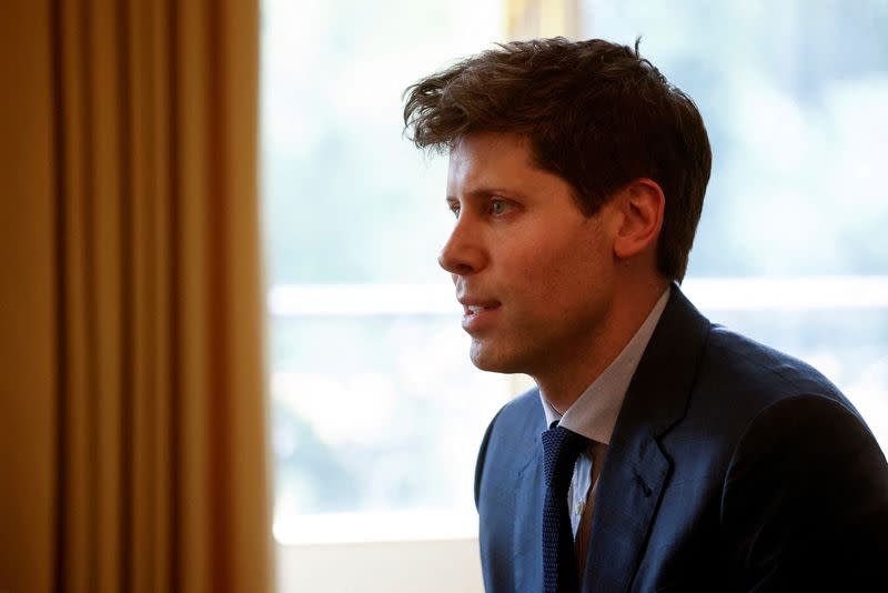 FILE PHOTO: French President Emmanuel Macron meets OpenAI CEO Sam Altman in Paris