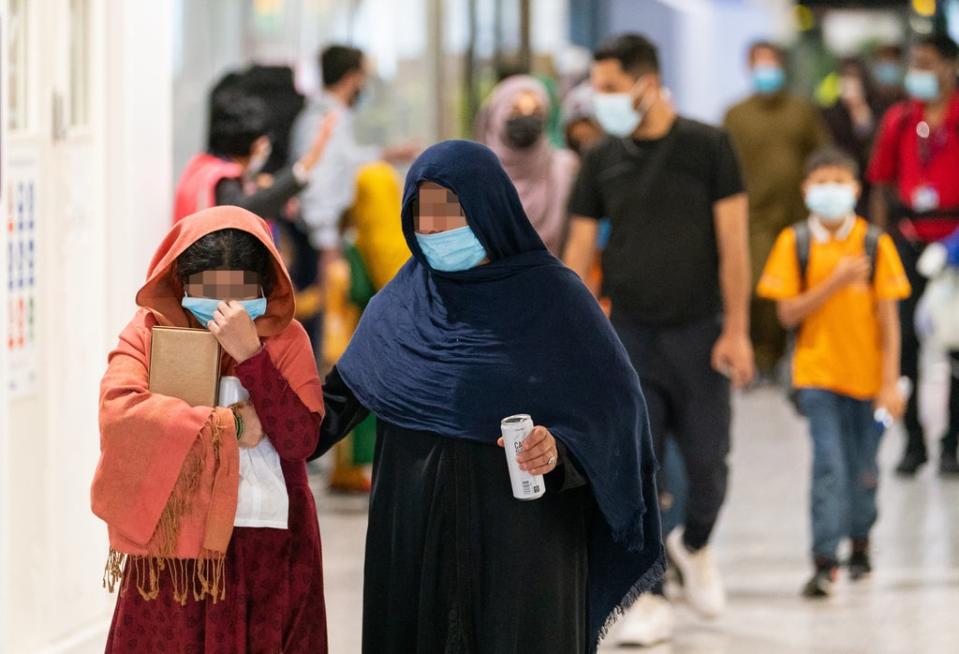 Refugees from Afghanistan arrive on a evacuation flight at Heathrow Airport, London. (Dominic Lipinski/PA) (PA Wire)