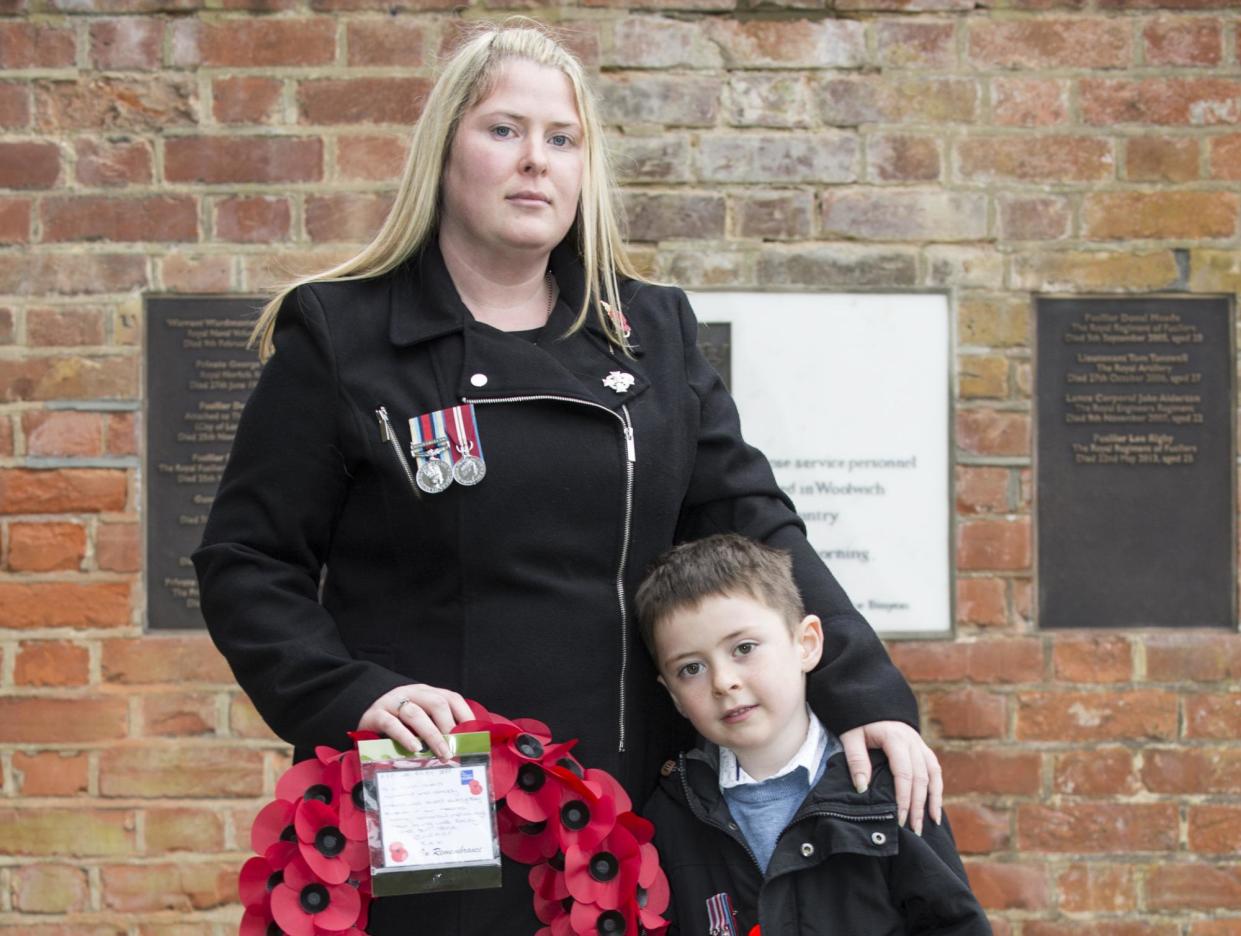 <span>Rebecca Rigby, widow of murdered soldier Lee Rigby, with their son Jack at an Armistice Day service in London in 2015. </span><span>Photograph: Ben Cawthra/Rex/Shutterstock</span>