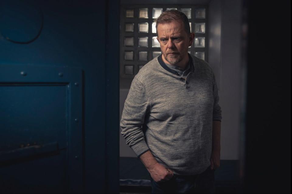 dan spencer, played by liam fox, in cell after arrest for punching lloyd