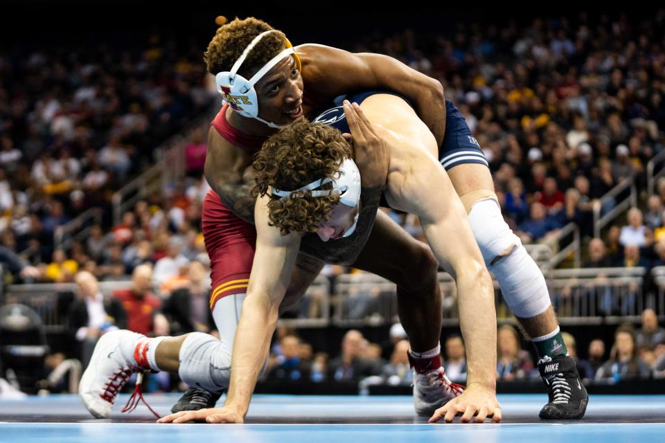 ISU's David Carr wrestles Penn State's Mitchell Mesenbrink in the 165 lbs. NCAA final Saturday, March 23, 2024, at the T Mobile Center in Kansas City.