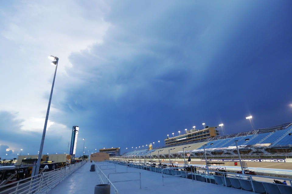 Clouds hover above Homestead-Miami Speedway during a NASCAR Truck Series auto race Saturday, June 13, 2020, in Homestead, Fla. (AP Photo/Wilfredo Lee)