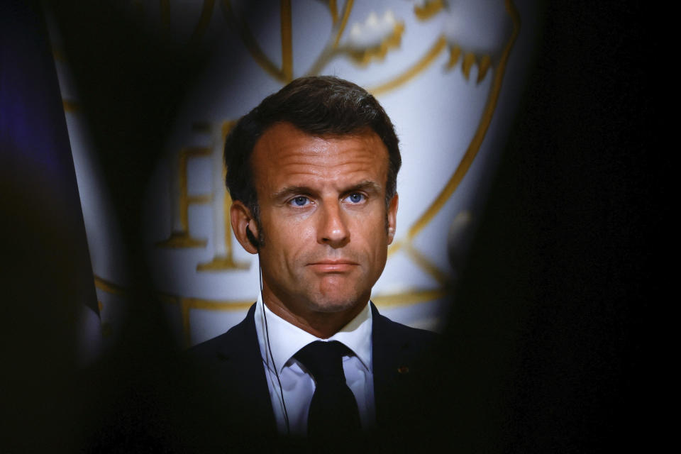 French President Emmanuel Macron attends a joint press conference with Polish President Andrzej Duda and German Chancellor Olaf Scholz, Monday, June 12, 2023 at the Elysee palace in Paris. Emmanuel Macron, German Chancellor Olaf Scholz and Polish President Andrzej Duda meet in Paris for talks focusing on military support for Ukraine's counteroffensive and future security guarantees to be given to the country, ahead of a NATO summit in July. (Sarah Meyssonnier, Pool via AP)