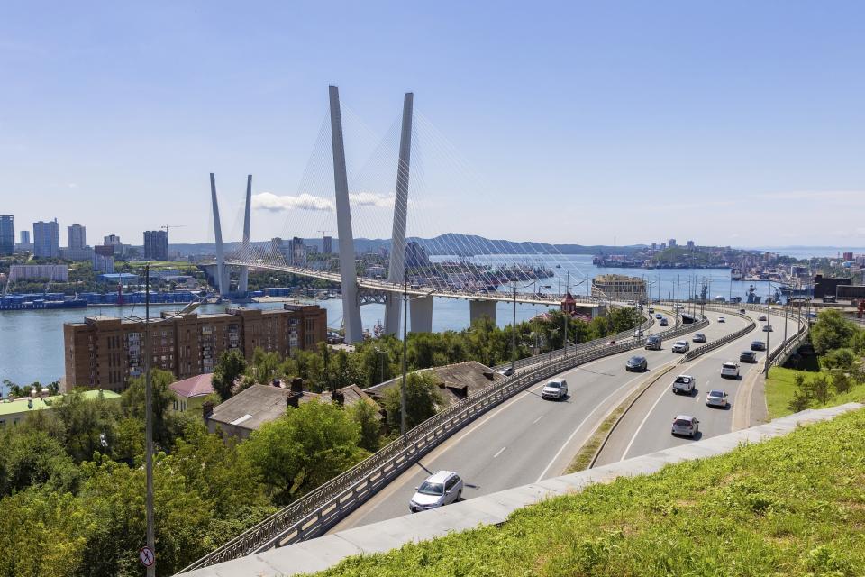 FILE - A view of the bridge connecting the Russky Island and Vladivostok, in Russia's far east, is seen on Aug. 26, 2023. An American soldier has been arrested in Russia and accused of stealing. That's according to two U.S. officials who spoke to The Associated Press. The soldier, who is not being identified, was stationed in South Korea and was in the process of returning home to the United States. Instead, he traveled to Russia. According to the officials, the soldier was arrested late last week in Vladivostok. It was unclear Monday, May 6, 2024, if the soldier is considered absent without leave, or AWOL. (AP Photo/Alexander Khitrov)