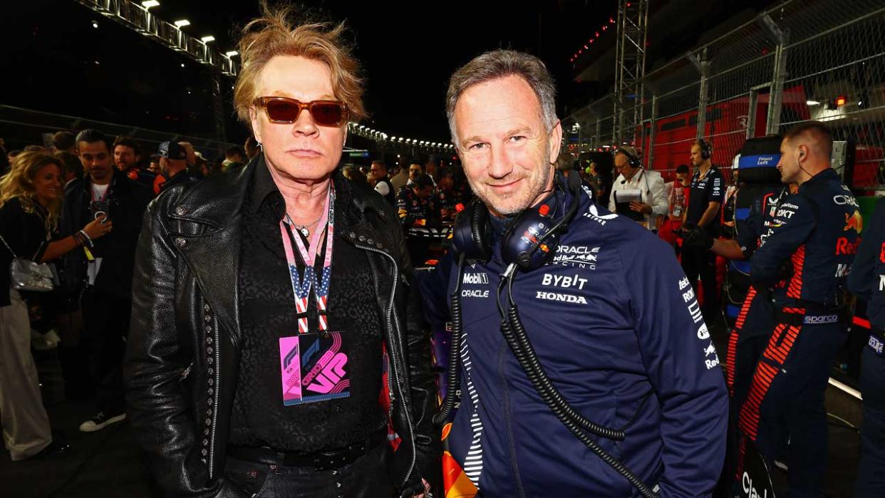  Axl Rose on the grid with Christian Horner. 