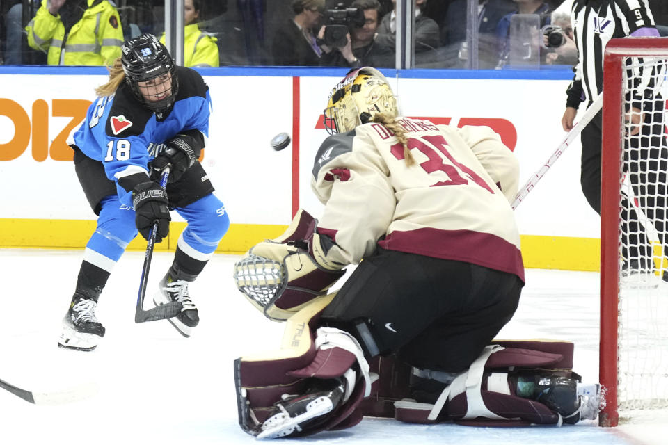 Toronto's Jesse Compher shoots on Montreal goaltender Ann-Renee Desbiens during the third period of a PWHL hockey game Friday, Feb. 16, 2024, in Toronto. (Chris Young/The Canadian Press via AP)