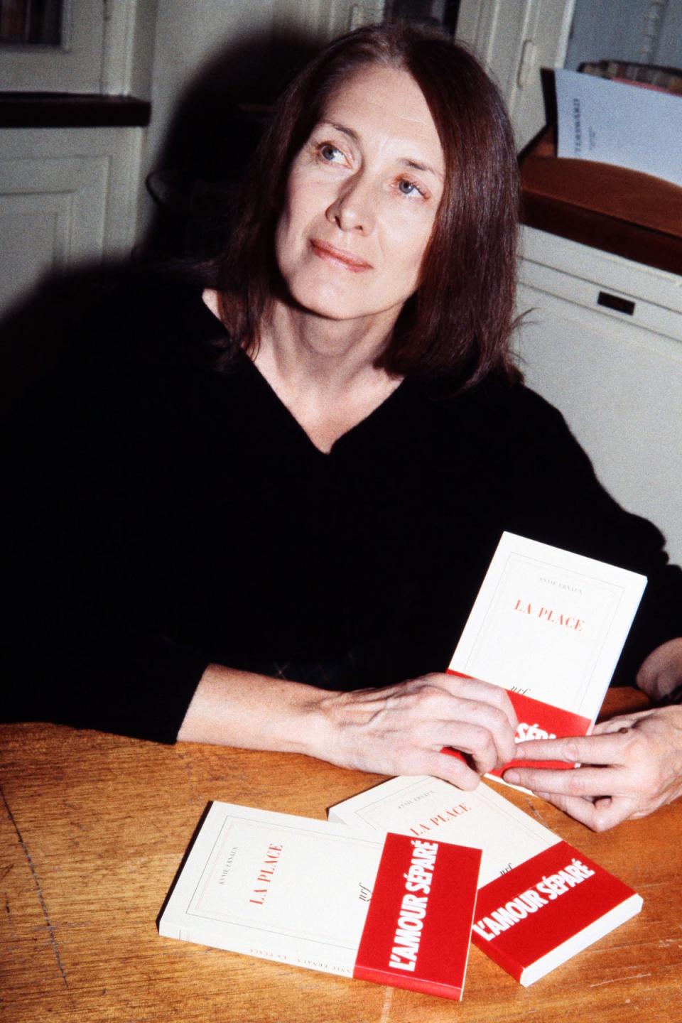 Ernaux with her novel The Place in 1984, after being awarded with the Prix Renaudot (AFP via Getty Images)