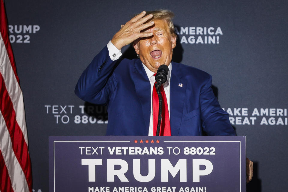 Former President Donald Trump speaks at a rally in Windham, N.H., on Tuesday. )