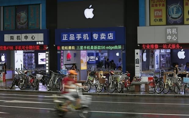 An Apple Store in Shenzhen, China. Apple makes huge revenues from the region - Reuters