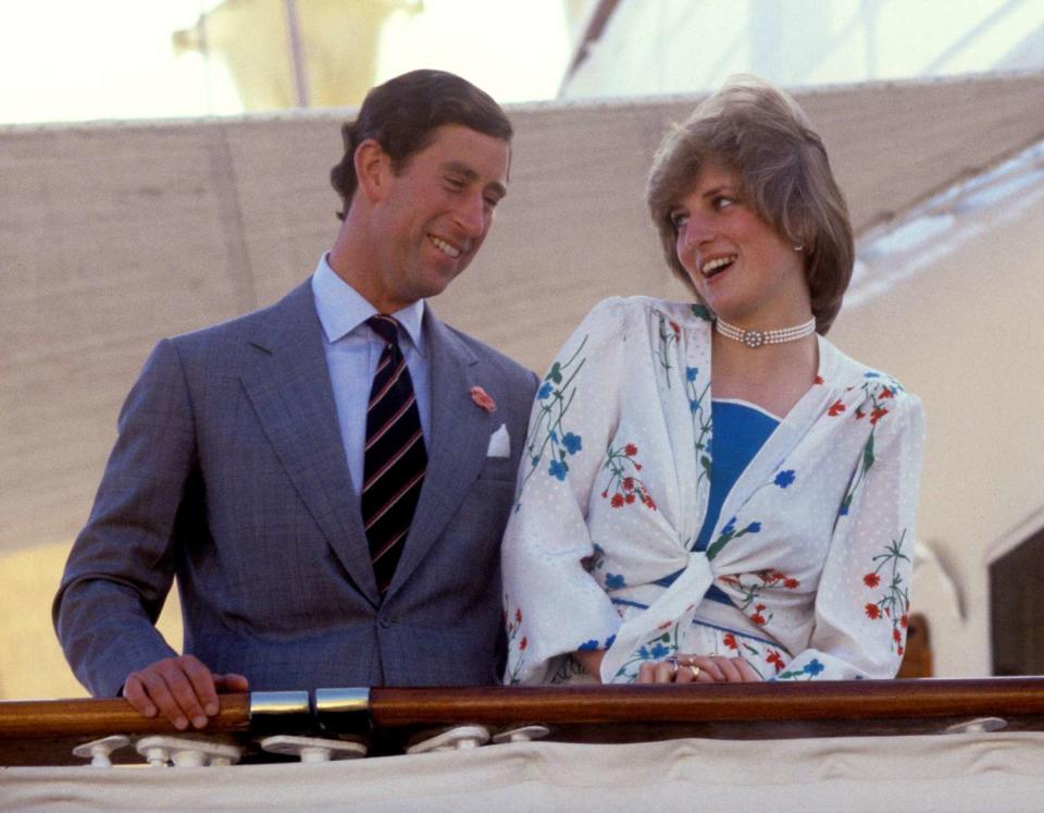 Prince and Princess of Wales, aboard the Royal Yacht Britannia as she sails away from Gibraltar for the rest of their honeymoon