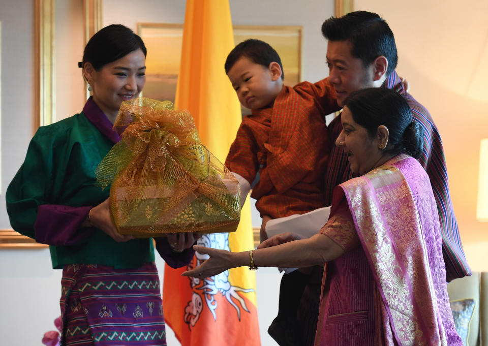 Indian Foreign Minister Sushma Swaraj presenting gifts King Jigme Khesar Namgyel Wangchuck, Queen Jetsun Pema and prince Jigme Namgyel Wangchuck in New Delhi in November 2017.&nbsp;