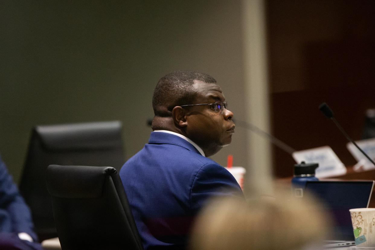 County Administrator John Gibbs looks over his shoulder during the board's meeting Tuesday, Feb. 28, 2023, at the Ottawa County Offices in West Olive.