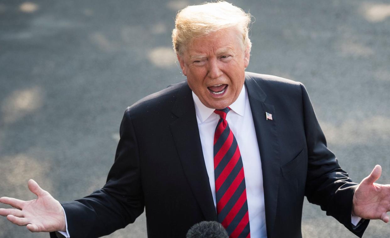 President Donald Trump stops to speak with reporters before departing for the G-7 summit on June 8. One week later, he was again confronted with reporters' questions on a&nbsp;variety of topics. (Photo: Jabin Botsford/The Washington Post via Getty Images)