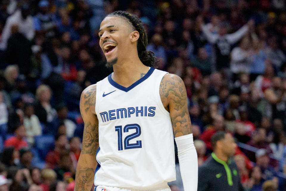 Memphis Grizzlies guard Ja Morant celebrates during his season debut against the New Orleans Pelicans at the Smoothie King Center in New Orleans on Dec. 19, 2023. (Matthew Hinton/USA TODAY Sports)
