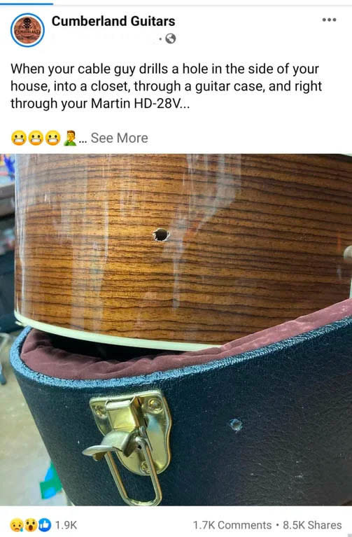 Facebook post by Cumberland Guitars shows a damaged Martin HD-28V guitar and case, with text about a cable guy accidentally drilling through them