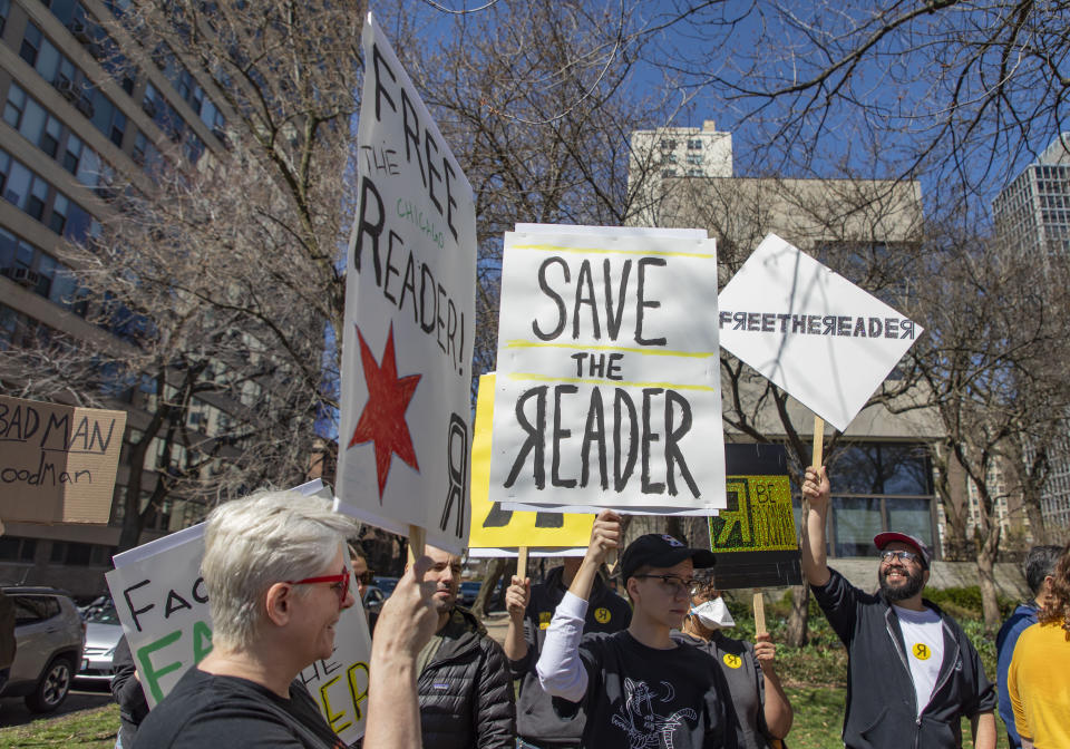 HOLD FOR STORY Staff and supporters of the Chicago Reader rally Thursday, April 21, 2022 outside the home of Reader investor Leonard Goodman. (Brian Cassella/Chicago Tribune via AP)