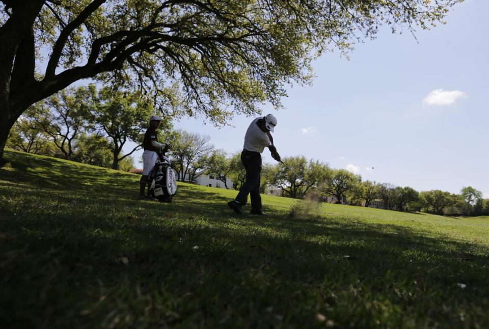 Hideki Matsuyama, of Japan, hits from the rough on the eighth hole as he practices for the Dell Technologies Match Play Championship golf tournament at Austin County Club, Tuesday, March 21, 2017, in Austin, Texas. (AP Photo/Eric Gay)