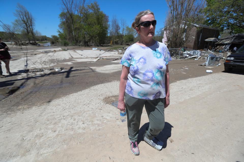 Bev Thompson lost her home along Saginaw Road in Sanford, Mich., on May 21.  The Sanford dam that held the Tittabawassee River failed, causing massive flooding that destroyed homes and businesses.