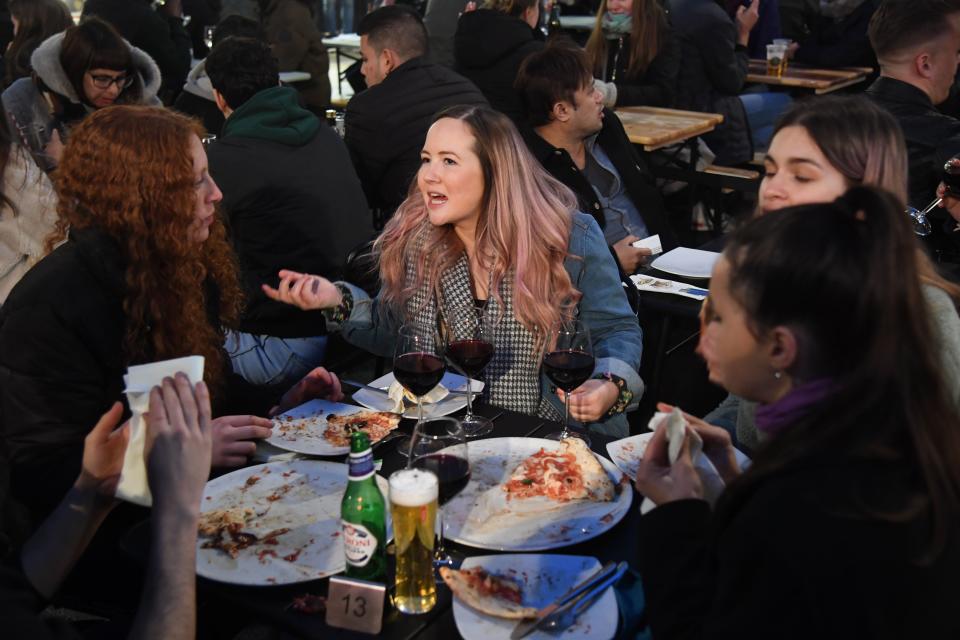 Diners enjoying a pizza after the restrictions were eased on MondayJeremy Selwyn