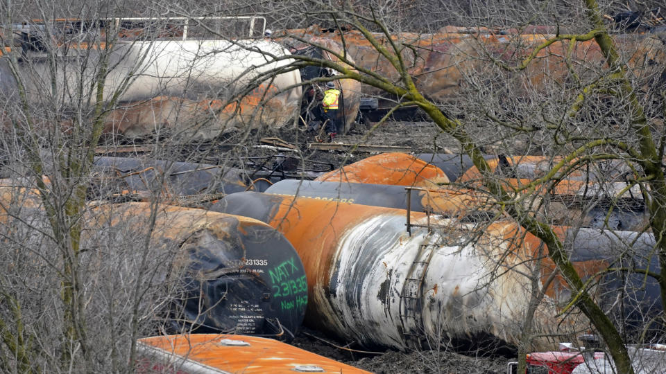 The cleanup of portions of a Norfolk Southern freight train that derailed Friday night in East Palestine, Ohio, continues on Thursday, Feb. 9, 2023. (AP Photo/Gene J. Puskar)