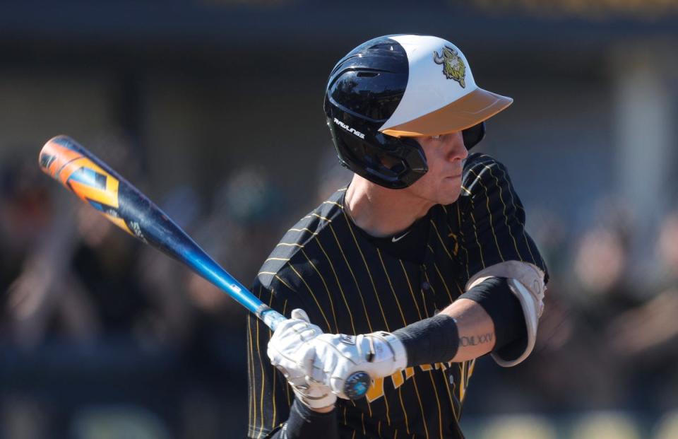 Bishop Verot player Maddix Simpson takes an at bat as his team hosted Loyola Academy from Chicago Friday April 5, 2024. Verot won the matchup with a final score of 13-3 in the 6th inning.