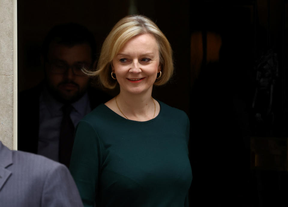 British Prime Minister Liz Truss walks outside Number 10 Downing Street, in London, Britain, October 12, 2022. REUTERS/Hannah McKay