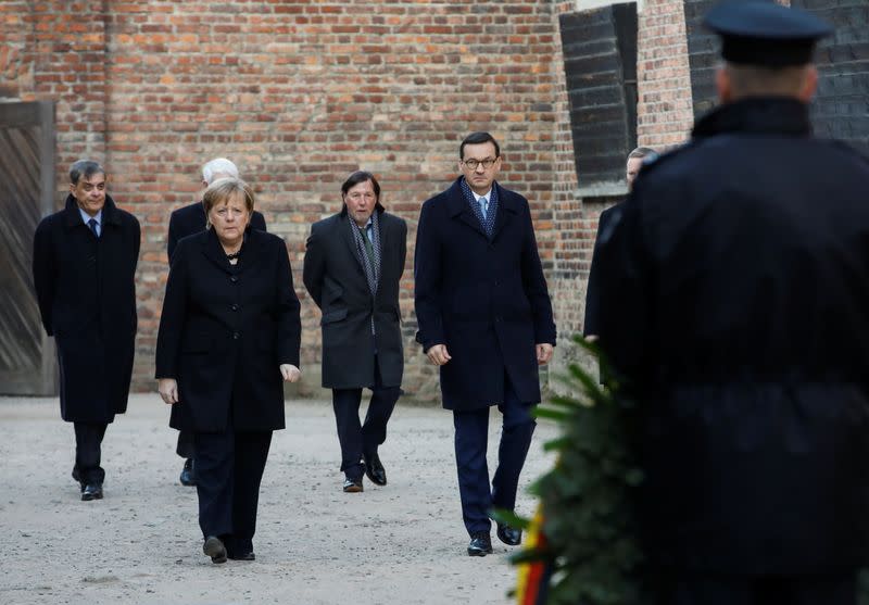 German Chancellor Angela Merkel and Polish Prime Minister Mateusz Morawiecki visit the Auschwitz-Birkenau memorial and museum