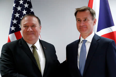 U.S. Secretary of State Mike Pompeo poses with Britain's Foreign Secretary Jeremy Hunt at the European Council in Brussels, Belgium, May 13, 2019. REUTERS/Francois Lenoir/Pool