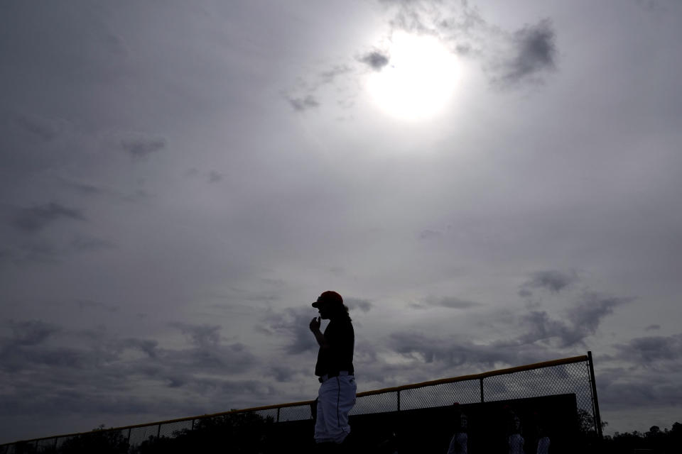 Detroit Tigers relief pitcher Andrew Chafin walks to a field during a baseball spring training workout Friday, Feb. 16, 2024, in Lakeland, Fla. (AP Photo/Charlie Neibergall)