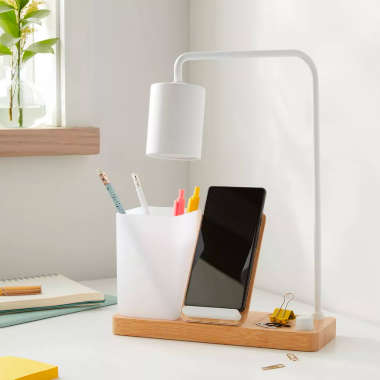 <p><a href="https://go.redirectingat.com?id=74968X1596630&url=https%3A%2F%2Fwww.target.com%2Fp%2Fdesk-lamp-with-wireless-charging-and-storage-compartment-includes-led-light-bulb-brightroom-8482%2F-%2FA-86941049&sref=https%3A%2F%2Fwww.cosmopolitan.com%2Flifestyle%2Fg41215180%2Fbest-target-products-under-50%2F" rel="nofollow noopener" target="_blank" data-ylk="slk:Shop Now;elm:context_link;itc:0;sec:content-canvas" class="link rapid-noclick-resp">Shop Now</a></p><p>Charging Desk Lamp</p><p>target.com</p><p>$29.75</p>