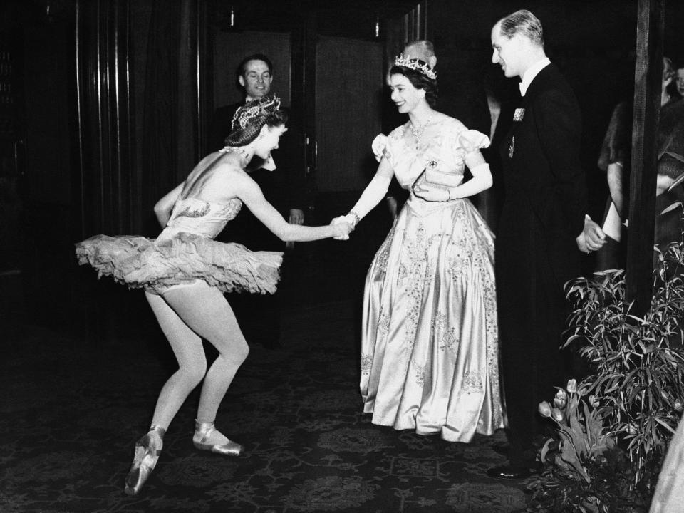 Then-Princess Elizabeth greets a ballerina in 1949.