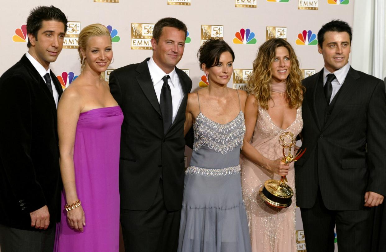 David Schwimmer, Lisa Kudrow, Matthew Perry, Courteney Cox Arquette, Jennifer Aniston and Matt LeBlanc of "Friends" appear in the photo room at the 54th annual Emmy Awards in Los Angeles on Sept. 22, 2002.