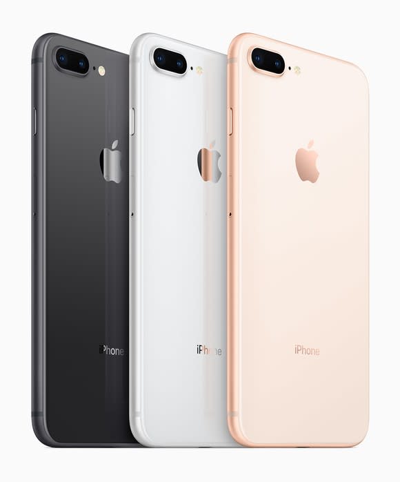 Apple's iPhone 8 Plus smartphones in Space Gray, Silver, and Gold.