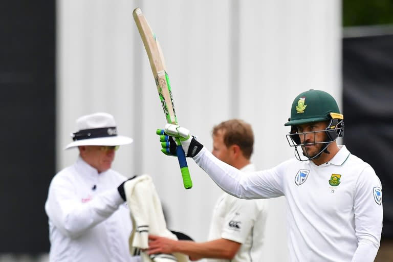 South Africa's captain Faf du Plessis celebrates 50 runs on day four of their first Test match against New Zealand, at the University Oval in Dunedin, on March 11, 2017