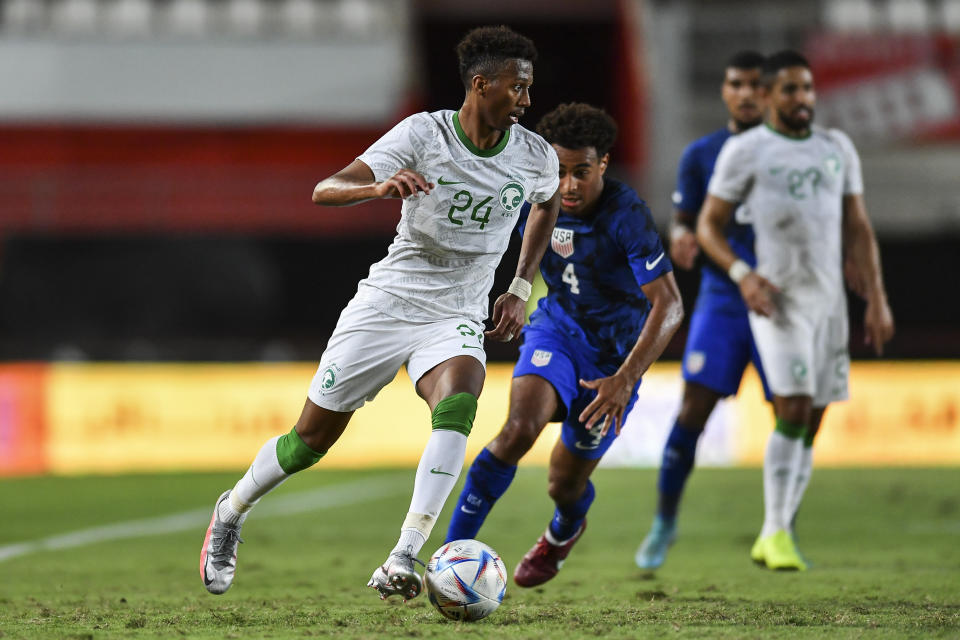 Saudi Arabia's Nasser Essa Aldawsari controls the ball during the international friendly soccer match between Saudi Arabia and United States in Murcia, Spain, Tuesday, Sept. 27, 2022. (AP Photo/Jose Breton)