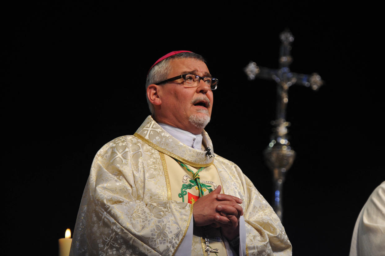 The new bishop of La Rochelle Georges Colomb looks during his episcopal ordination by the Archbishop of Paris on May 5, 2016 at the Parc des expositions in La Rochelle, western France. (Photo by XAVIER LEOTY / AFP)