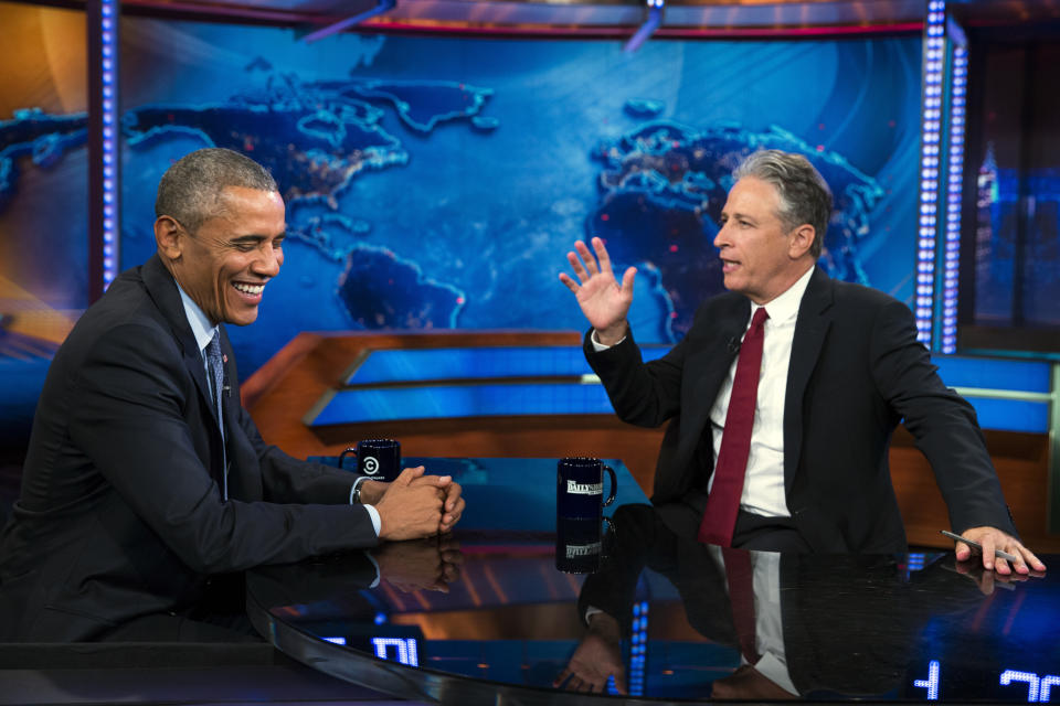 FILE - President Barack Obama, left, talks with Jon Stewart, host of Comedy Central's "The Daily Show" during a taping in New York on July 21, 2015. (AP Photo/Evan Vucci, File)