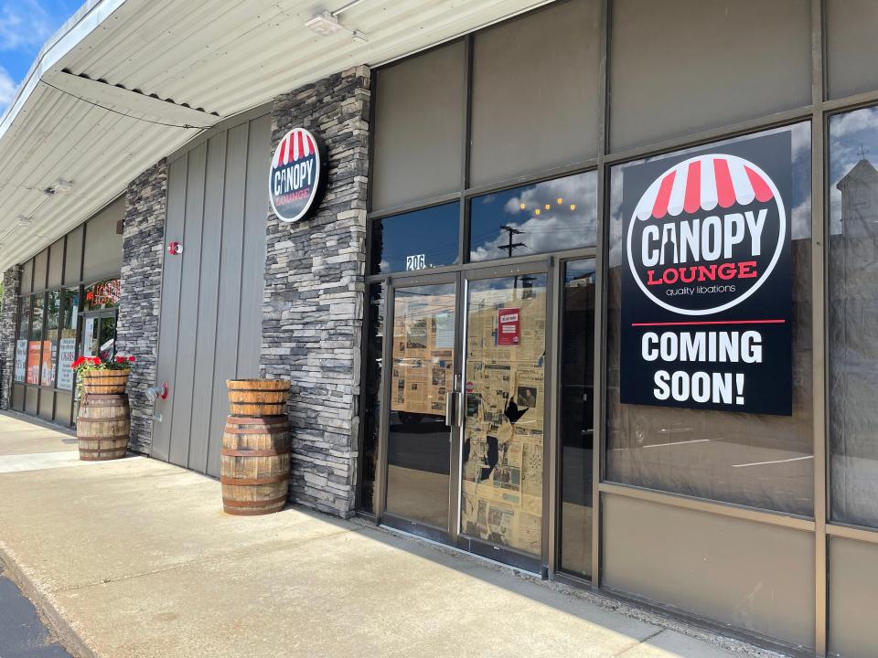 A former auto parts store next to John Kallabat's gourmet liquor store in downtown Brighton, shown Thursday, June 9, 2022, is a soon-to-open lounge bar and small plates restaurant.