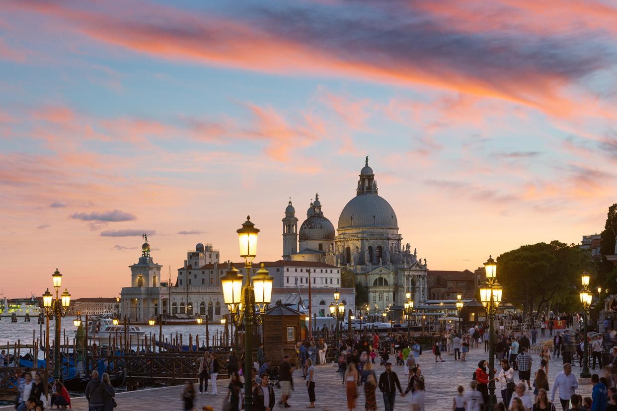 View of the Basilica di Santa Maria della Salute at sunset from Piazza San Marco, Venice.