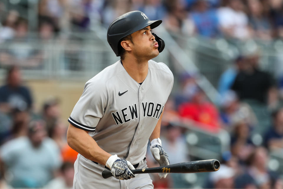 MINNEAPOLIS, MN - JUNE 9: Giancarlo Stanton #27 of the New York Yankees watches his three-run home run against the Minnesota Twins in the third inning of the game at Target Field on June 9, 2021 in Minneapolis, Minnesota. (Photo by David Berding/Getty Images)