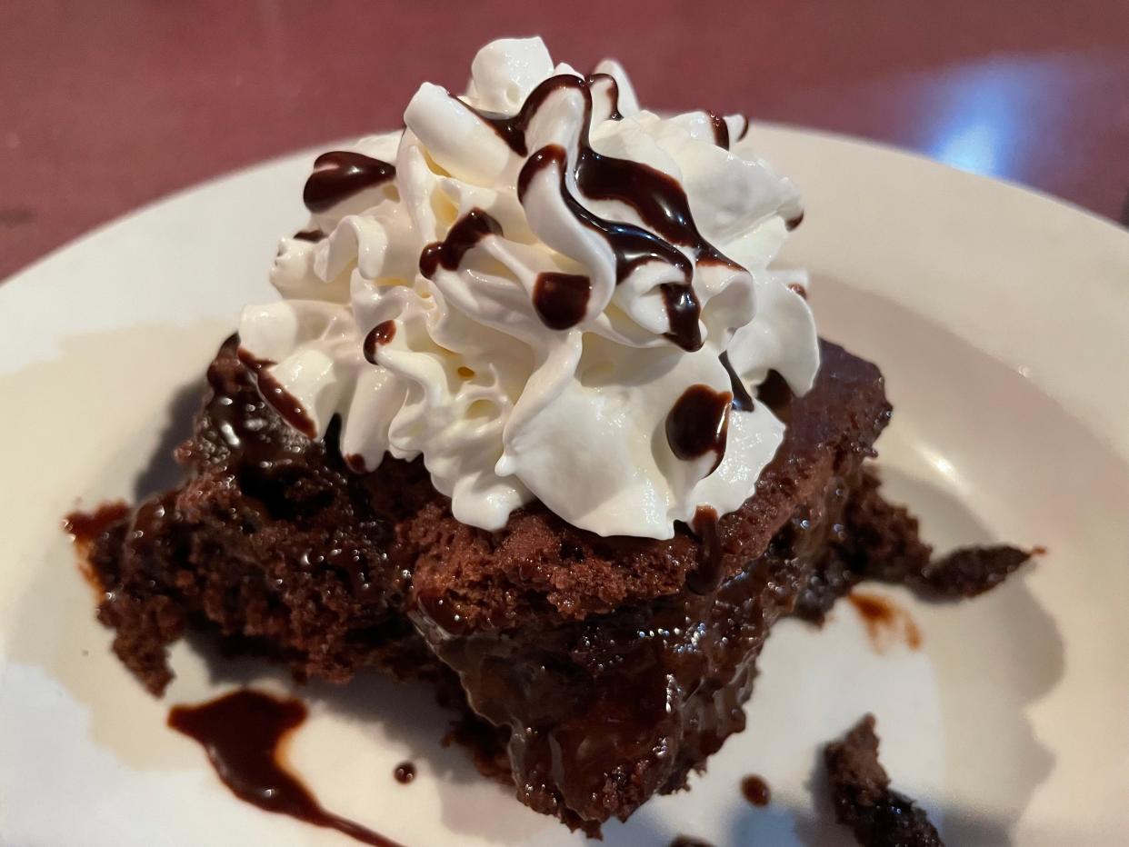 The triple chocolate cake with whipped cream on top is homemade, as are all the desserts at Pete's Place in Maynardville.