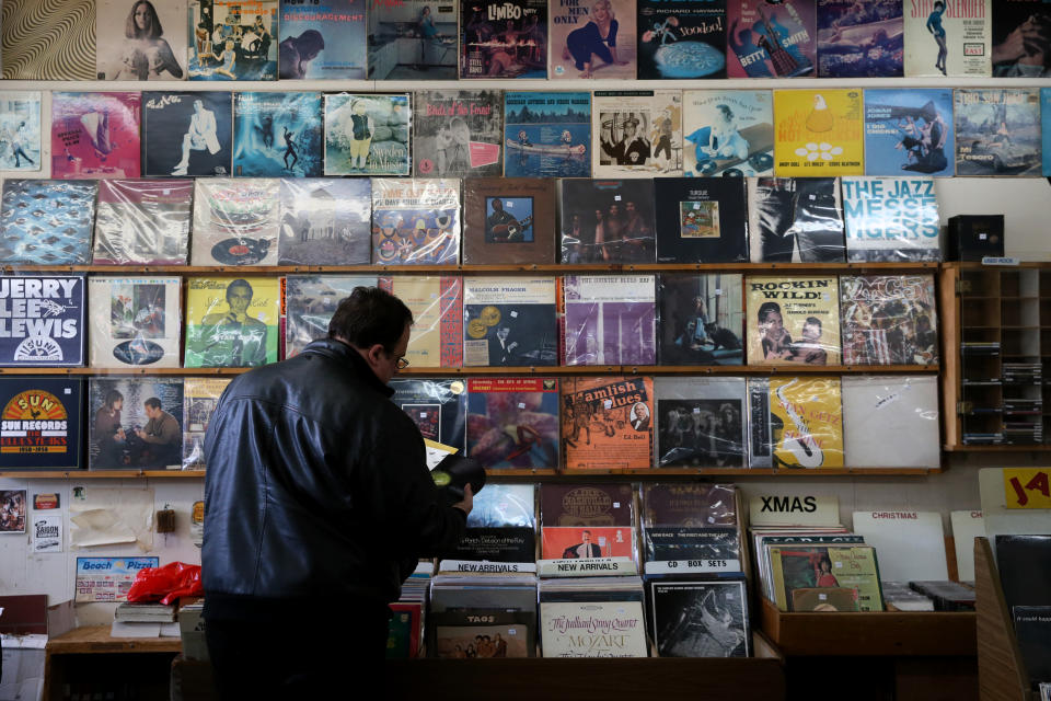 CAMBRIDGE, MA - NOVEMBER 24: Gerald Fusco examines records while shopping at Stereo Jack's on Massachusetts Avenue in Cambridge, MA on Small Business Saturday, Nov. 24, 2018. (Photo by Craig F. Walker/The Boston Globe via Getty Images)