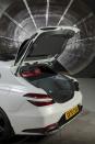 <p>Genesis claims luggage room is 16 cubic feet with the rear seats up and 54 cubic feet with them folded.</p>