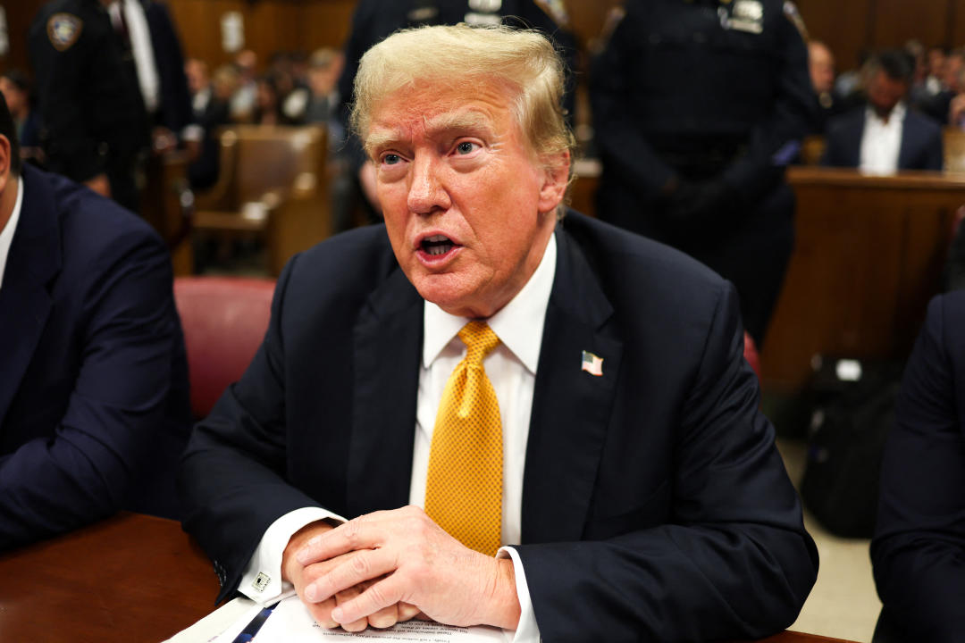 Trump awaits the start of proceedings in his criminal trial at Manhattan criminal court in New York City on May 29.