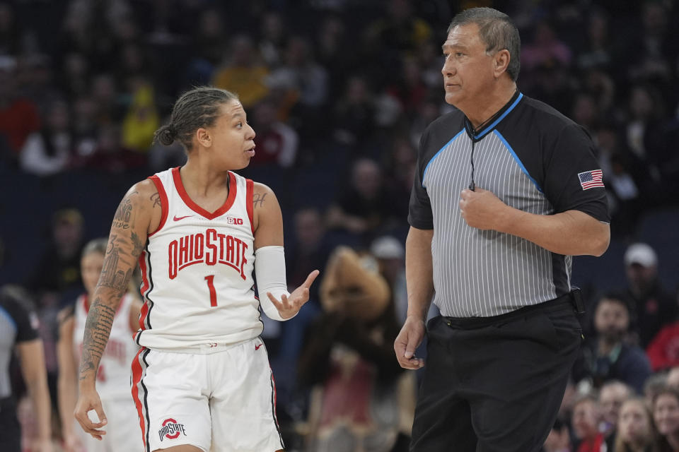 Ohio State guard Rikki Harris (1) talks with a referee after a foul called on Ohio State during the first half of an NCAA college basketball quarterfinal game against Maryland at the Big Ten women's tournament Friday, March 8, 2024, in Minneapolis. Maryland upsets No. 3 Ohio State 82-61. (AP Photo/Abbie Parr)