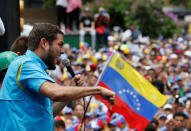 Opposition lawmaker Juan Requesens speaks during a rally against Venezuela's President Nicolas Maduro in Caracas, Venezuela May 1, 2017. REUTERS/Carlos Garcia Rawlins