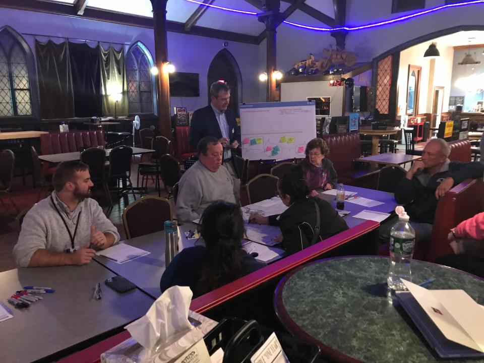 Residents discuss what changes they would like to have in Whittenton Village during a Taunton Redevelopment Authority meeting at Broken Chains Bike Church on Tuesday, Oct. 5, 2022.
