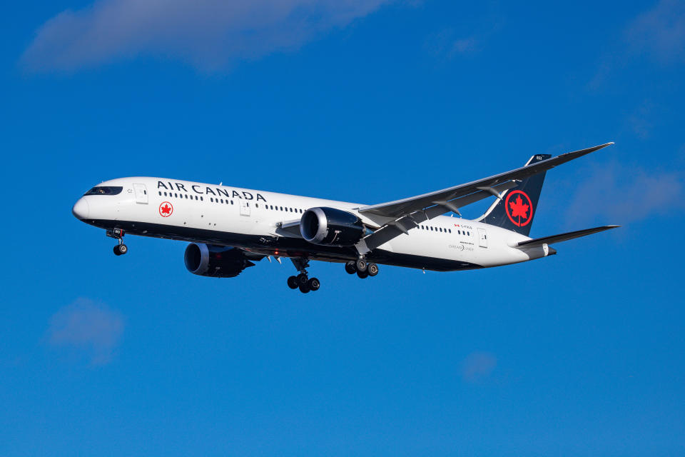Air Canada Boeing 787-9 Dreamliner aircraft landing at London Heathrow International Airport LHR EGLL during a blue sky summer day in England, UK, on 2 August 2019. The airplane that is on final approach before the runway has 2x GEnx-1B jet engines and has the registration C-FVLQ. Air Canada AC ACA is the flag carrier and largest airline carrier of Canada and is a Star Alliance aviation alliance member. The airline connects the British capital to Calgary, Halifax, Montréal Trudeau, Ottawa, St. John's, Toronto Pearson and Vancouver airports. (Photo by Nicolas Economou/NurPhoto via Getty Images)