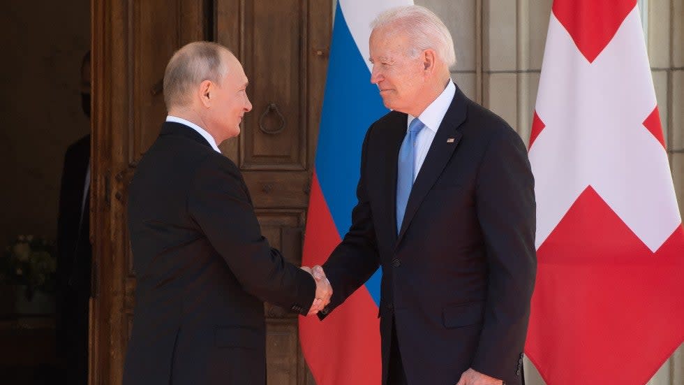 President Biden and Russian President Putin shake hands in Geneva