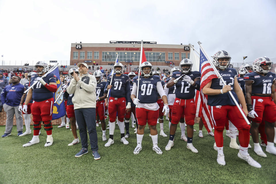 MOBILE, AL - NOVEMBER 12: South Alabama Jaguars head coach Kane Wommack and his team prepare to take the field before a college football game between the Texas State Bobcats and the South Alabama Jaguars on November 12, 2022, at Hancock-Whitney Stadium, in Mobile, Alabama. (Photo by Bobby McDuffie/Icon Sportswire via Getty Images)